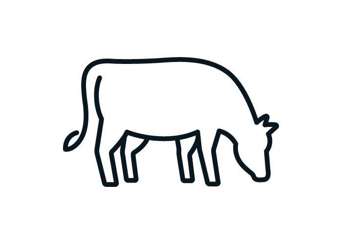 Black and white icon of a cow with it's head down like it's eating grass