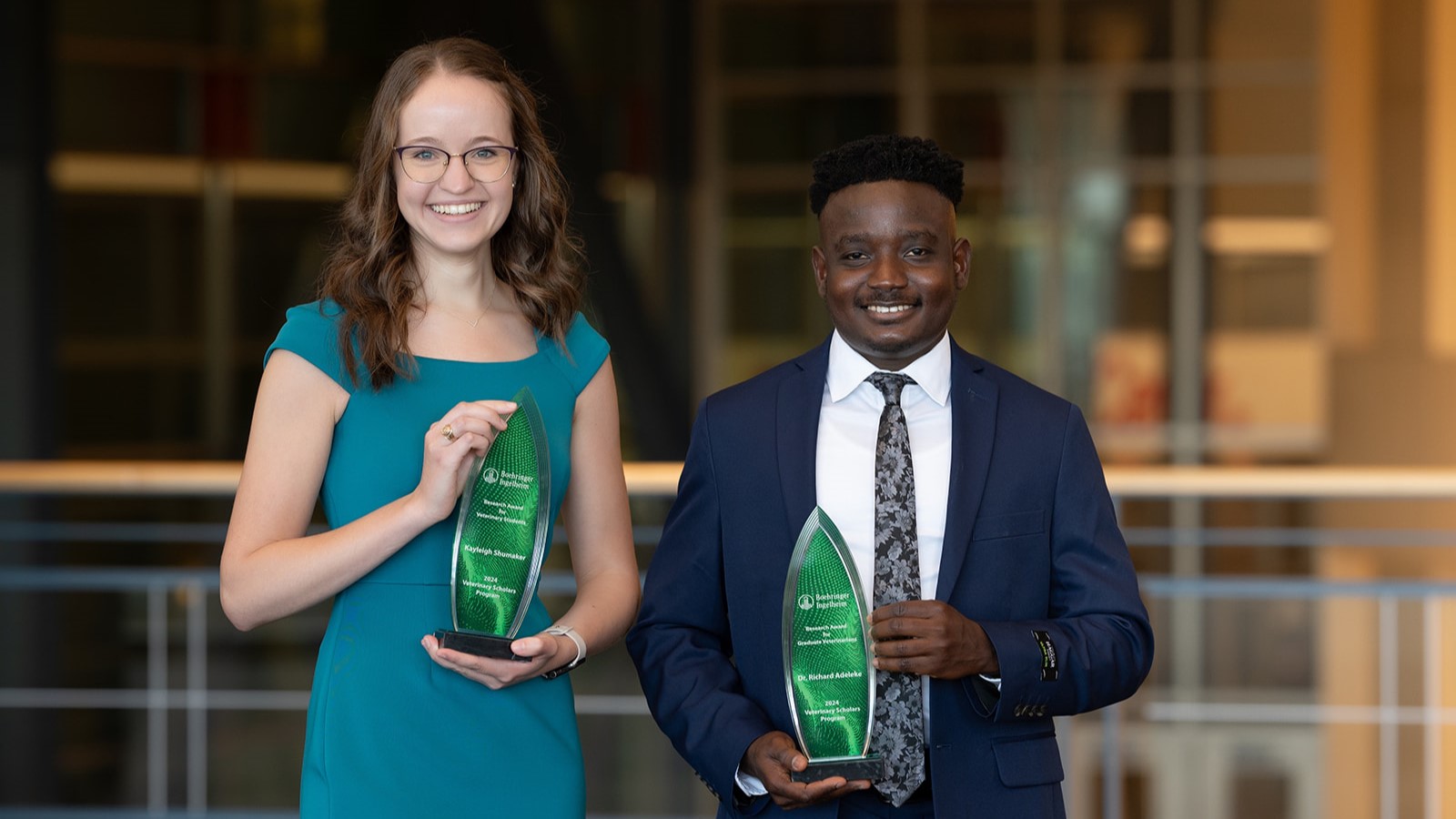 Veterinary Scholars Symposium research award winners display their awards.