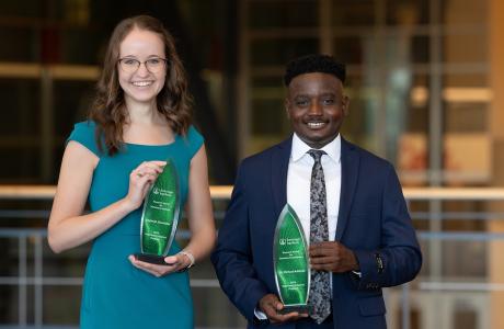 Veterinary Scholars Symposium research award winners display their awards.